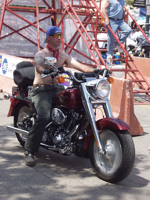 tattooed motorcyclist